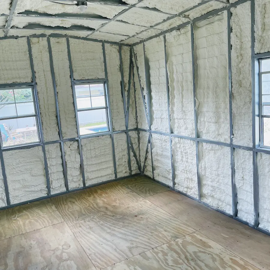 Closed-cell spray foam insulation applied to wall cavities in a residential project in Sturgis